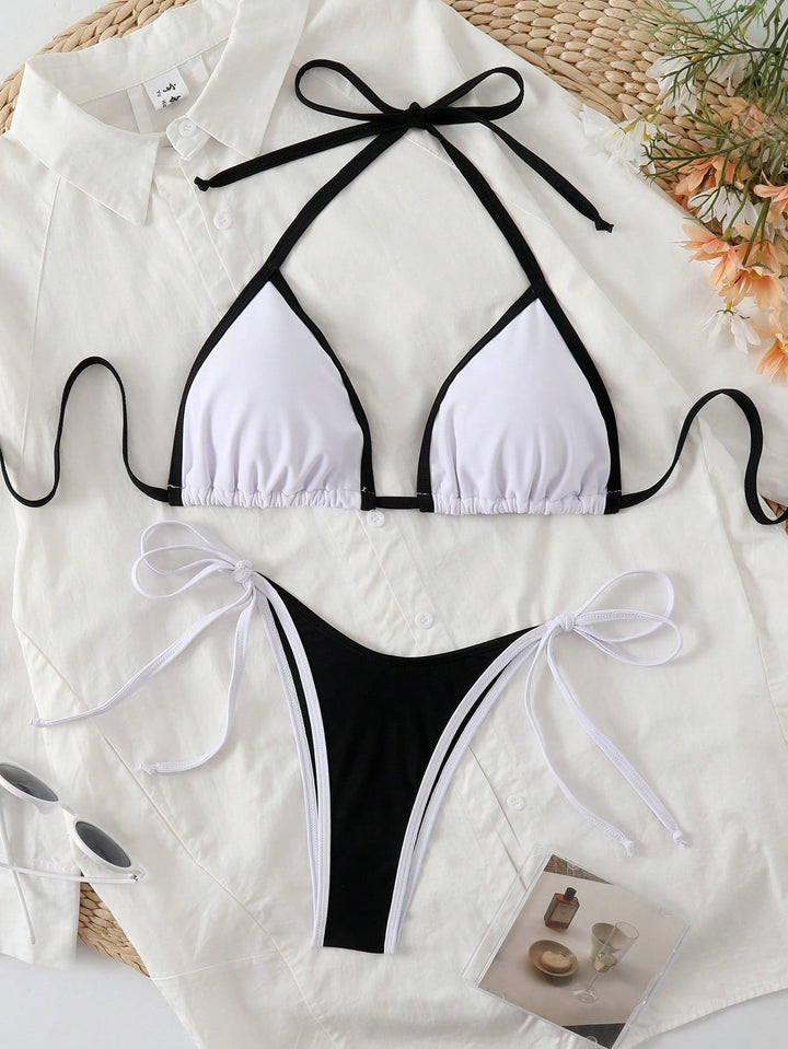Kobiece bikini w trójkąt z kontrastowym wykończeniem i wiązaniem po bokach