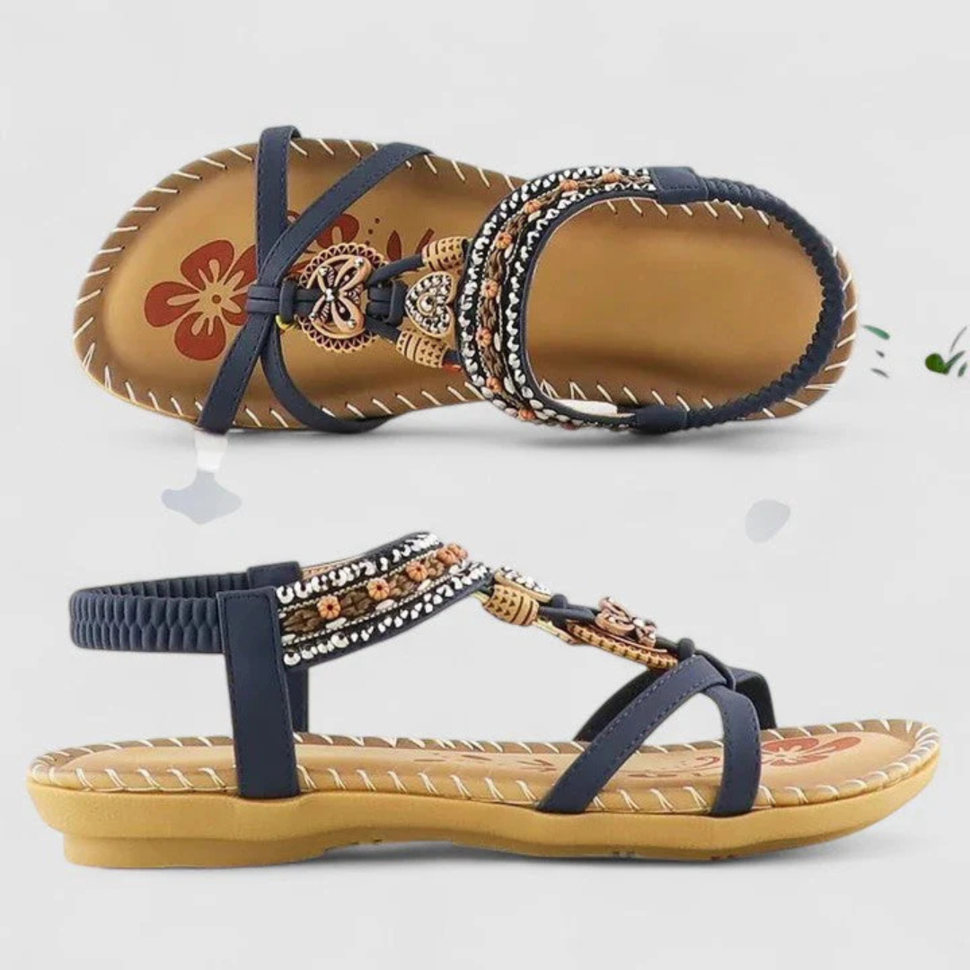 Kobiece sandały z ozdobnymi paskami – płaskie buty na lato