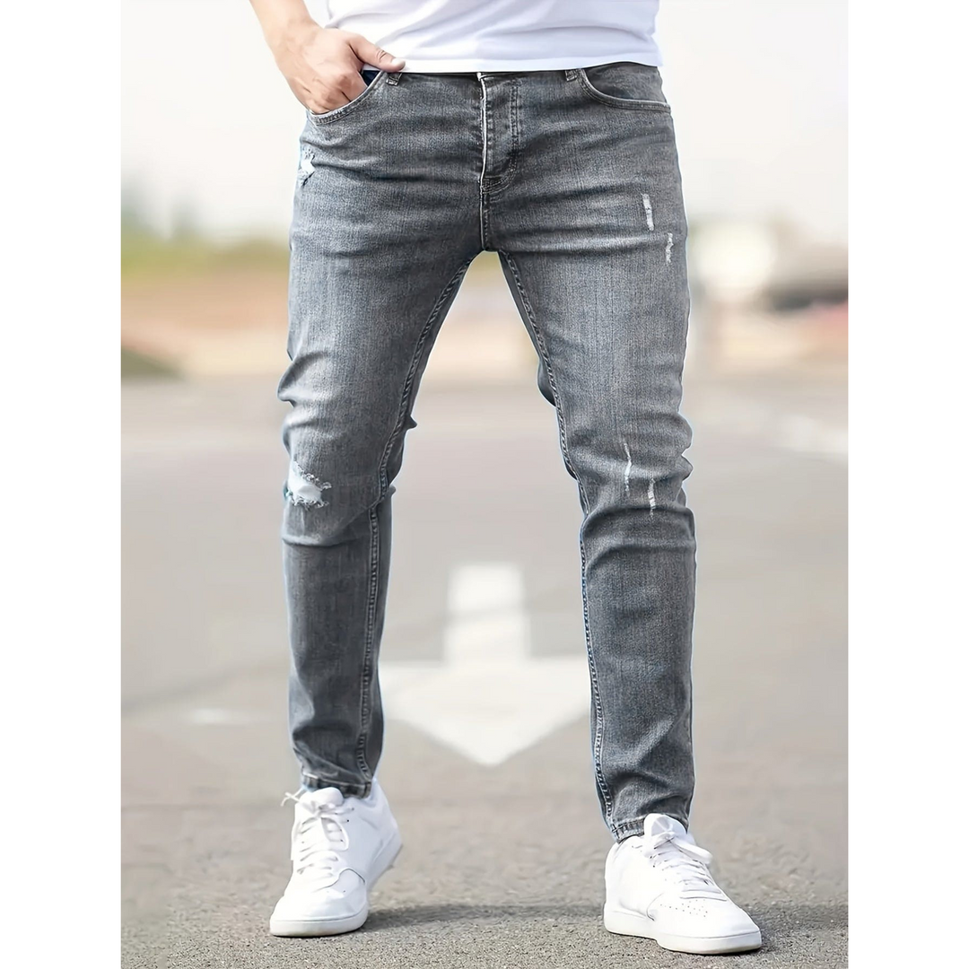 Męskie jeansy w stylu slim fit z przetarciami