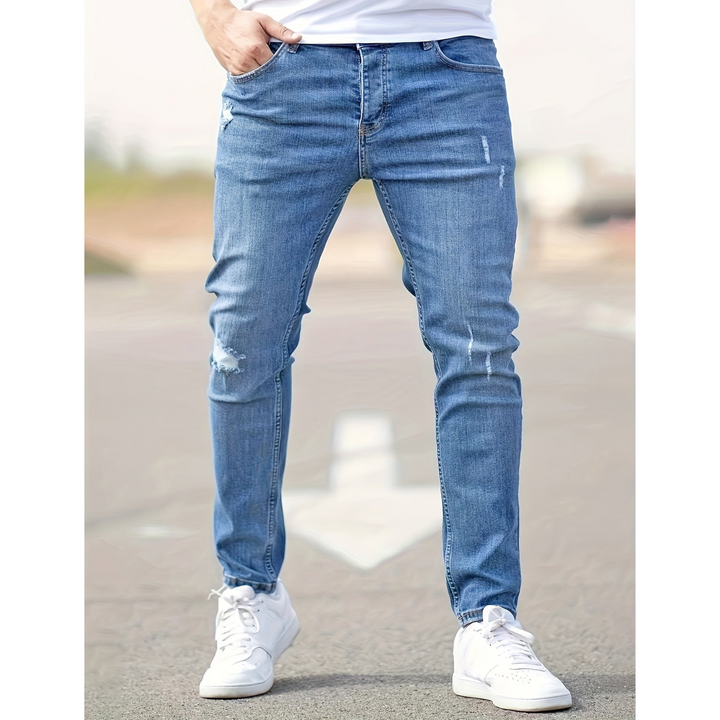 Męskie jeansy w stylu slim fit z przetarciami