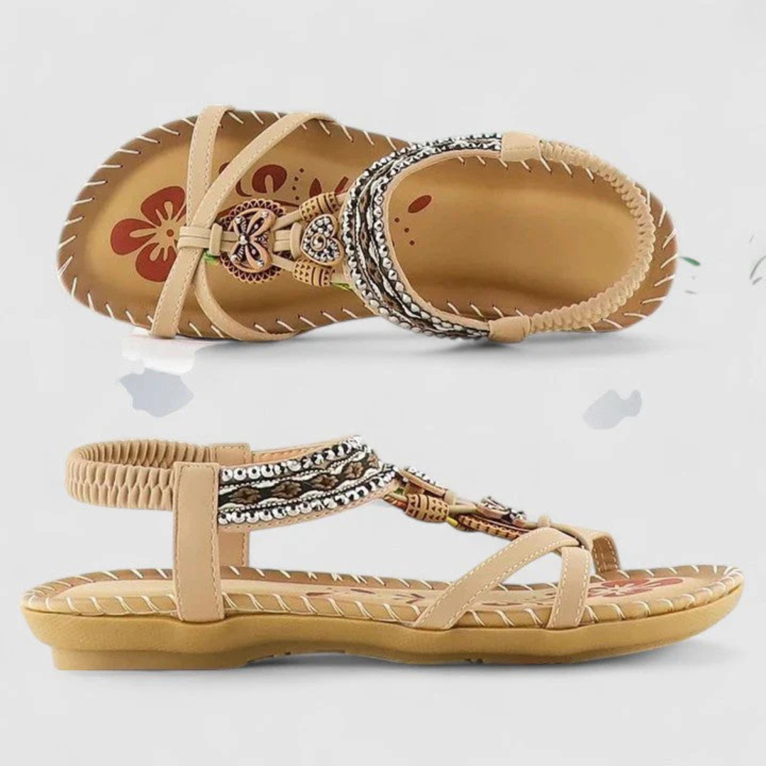 Kobiece sandały z ozdobnymi paskami – płaskie buty na lato