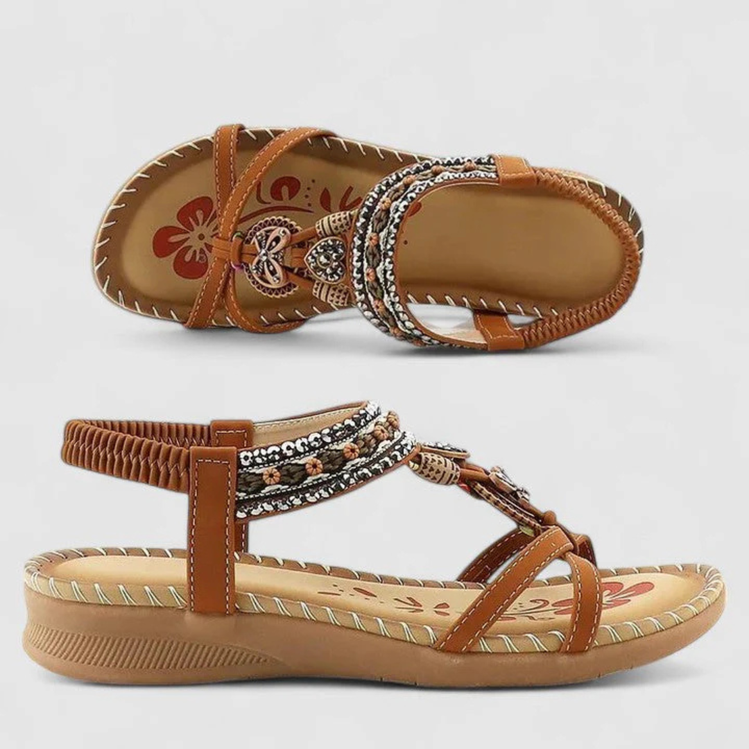 Kobiece sandały z ozdobnymi paskami – płaskie buty na lato