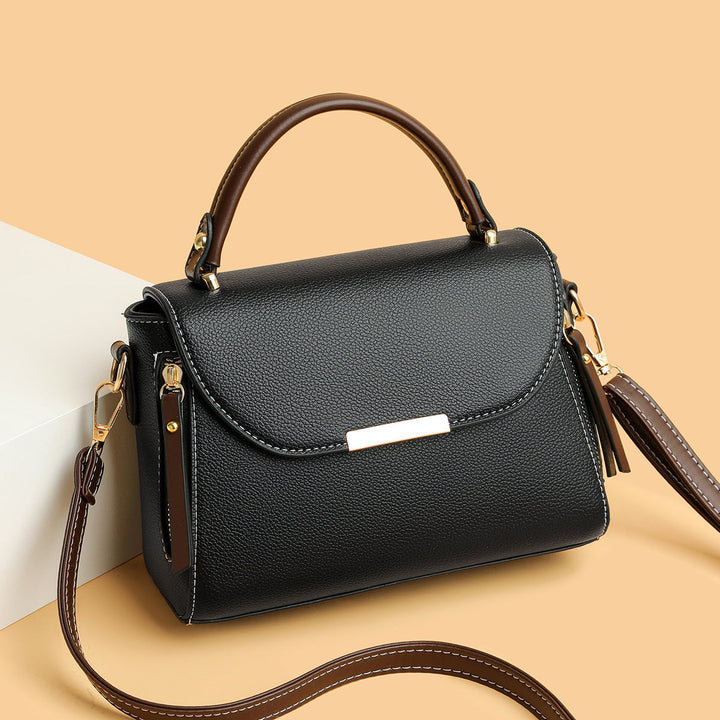 Kobieta strukturalna torebka crossbody z kontrastowym paskiem