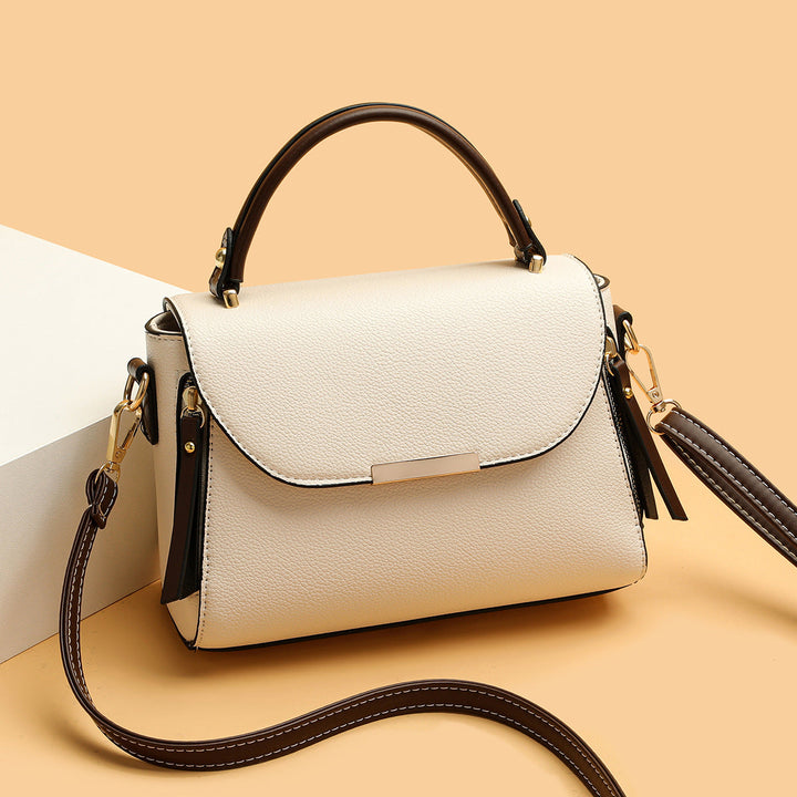 Kobieta strukturalna torebka crossbody z kontrastowym paskiem