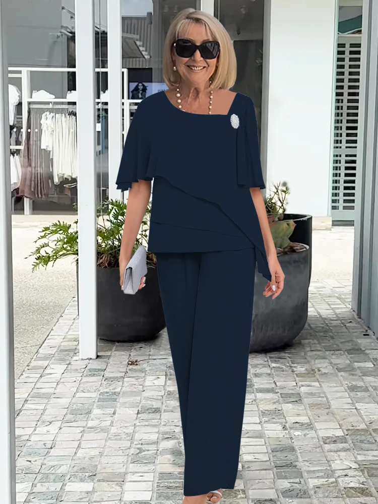 Kobiece warstwowe topy i szerokie spodnie – Elegancka wieczorowa stylizacja