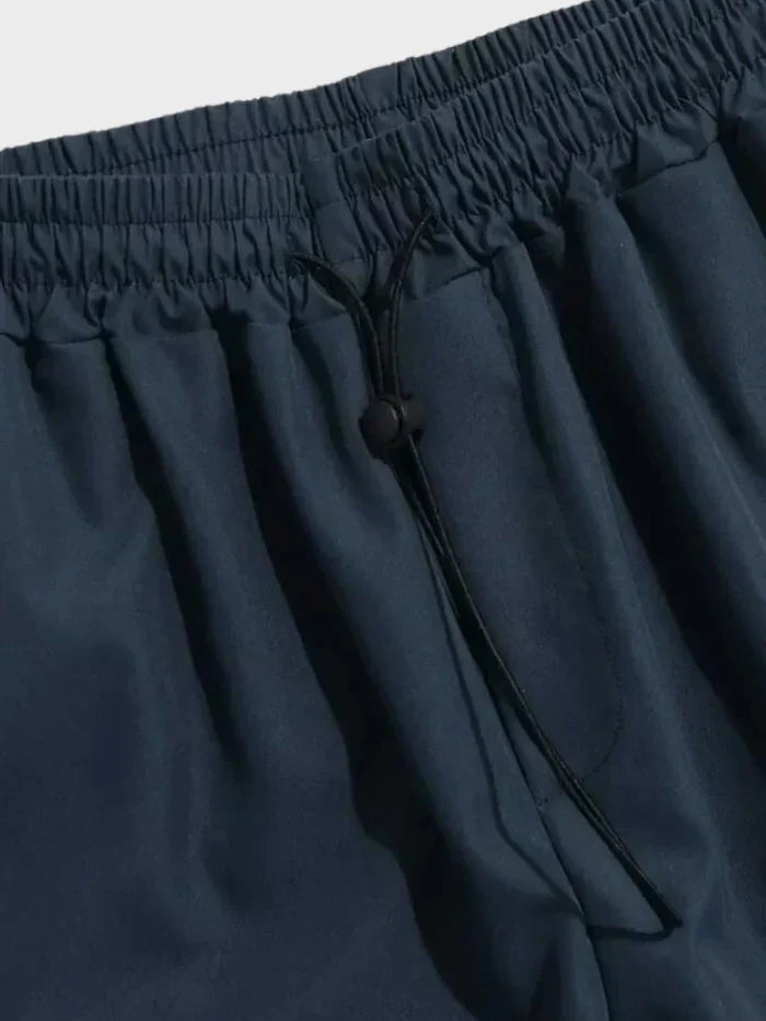 Męskie Spodnie Cargo z Szerokimi Nogawkami – Luźne Spodnie Streetwear z Elastycznym Pasem i Kieszeniami Użytkowymi