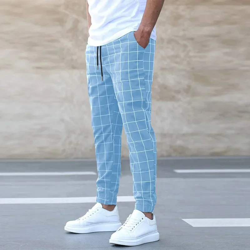 Męskie dresowe spodnie z nadrukiem i ściągaczem